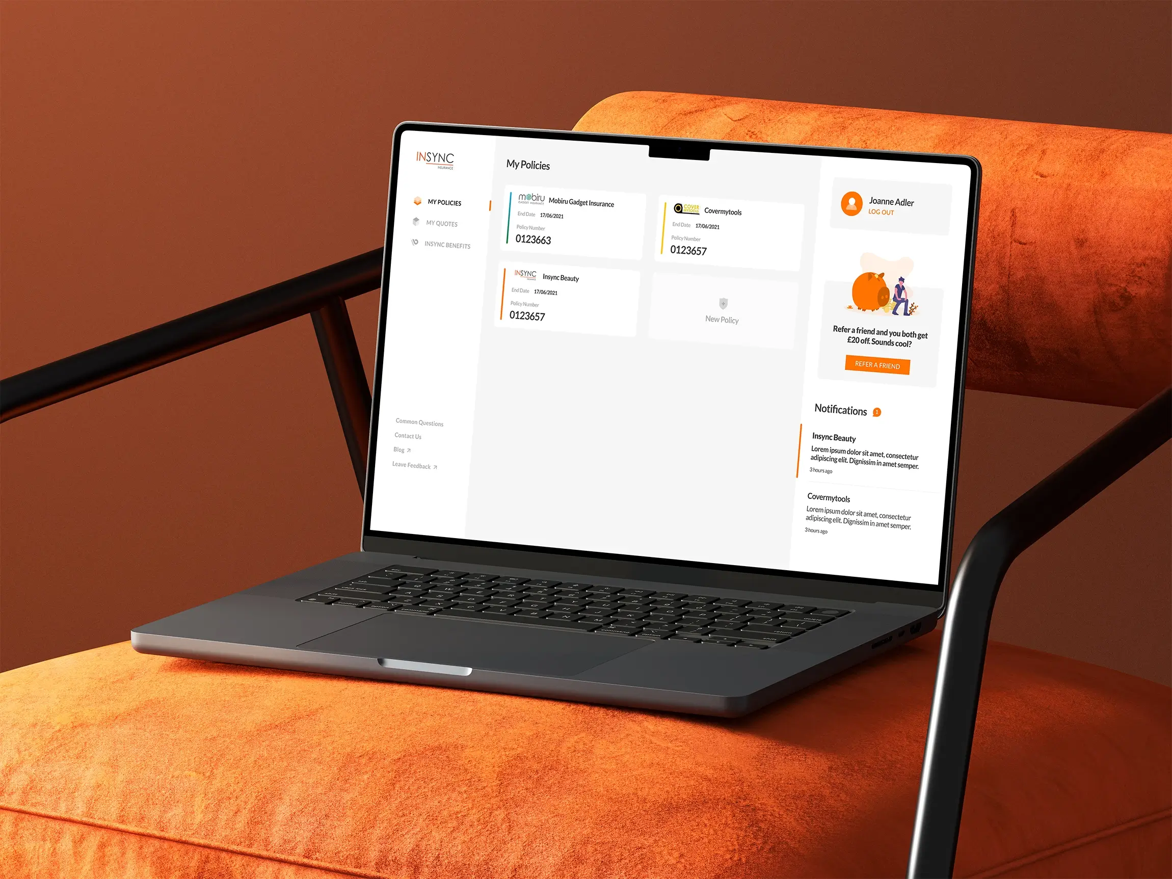 An open MacBook laptop resting on an orange velvet chair, displaying the Insync Insurance dashboard with widgets.